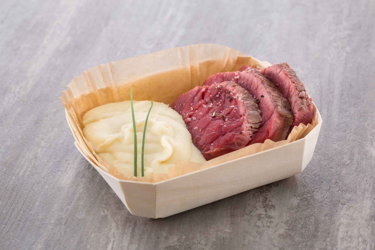 meat and potatoes served in panibois baking molds